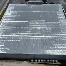 10-Year-Uniflex-Acrylic-Waterproof-System-over-the-metal-roof-at-Roses-in-Alma-GA 2
